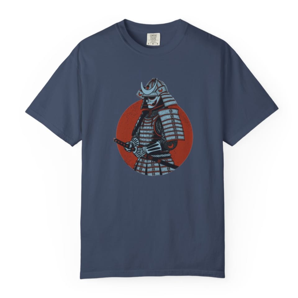 A dark blue t-shirt with a graphic of a samurai in armor holding a katana against a red circle.